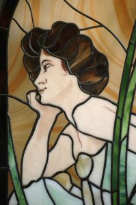 Photo by Don Lipps - Painting by Alphonse Mucha reproduced in stained glass by Bob Vogel of St. Peter.