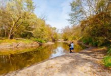 Photo by Rick Pepper - Kids play on the banks during lower water, typically in the fall.