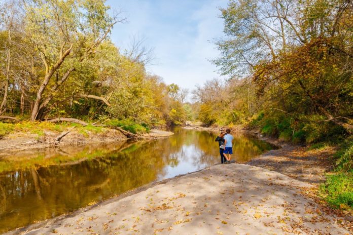 Photo by Rick Pepper - Kids play on the banks during lower water, typically in the fall.