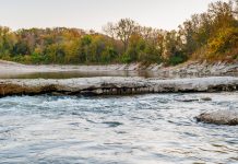 Photo by Rick Pepper - Looking south onto the Blue Earth River, notice the wood structure under concrete