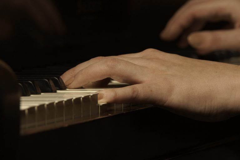 The hands of poet & musician, Jill Niebuhr, aka, Jammin, The Warrior from St. Peter, MN