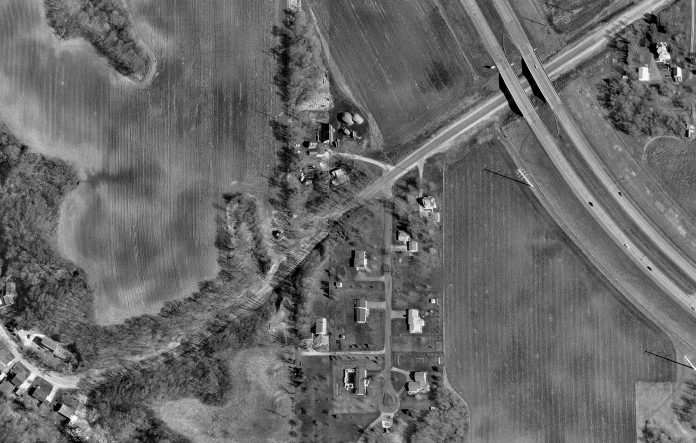 Photo courtesy of the City of Mankato - Mankato, MN - Ivy Lane satellite image prior to 2000. The top of the image is due north and the future Victory Drive bridge will be at the bottom center of this image. Today's remnant of Thompson Ravine Road is on the left.