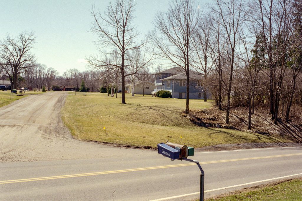 Photo by Rick Pepper - Mankato, MN - April 25, 2000 looking south down Ivy Lane, Roger Huettl's (former) house on the right.