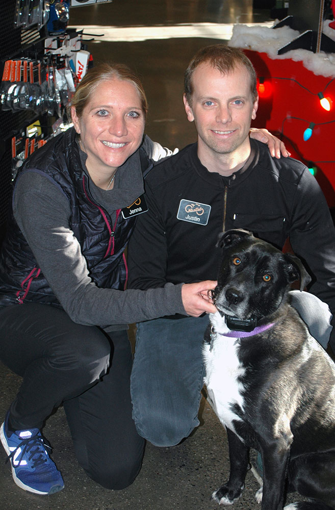 Photo by Don Lipps - Jenna and Justin Rinehart, owners of Nicollet Bike Shop in Mankato along with shop dog, Millie.