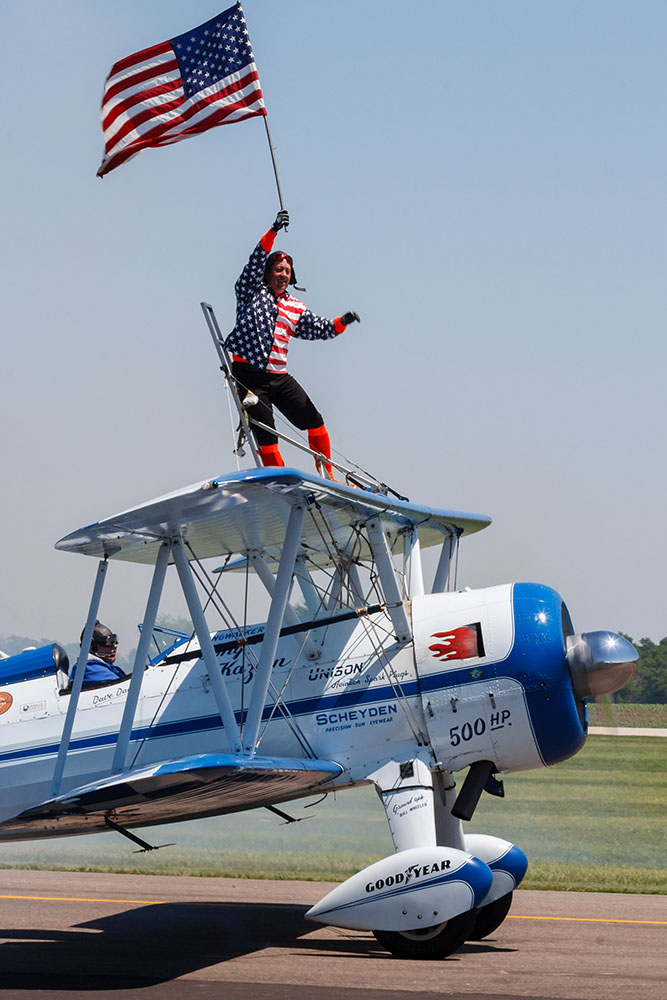 Photo by Rick Pepper - 2012 Mankato Air Show - Wing-walker Dave Kazian & stunt pilot Dave Dacy bring it home