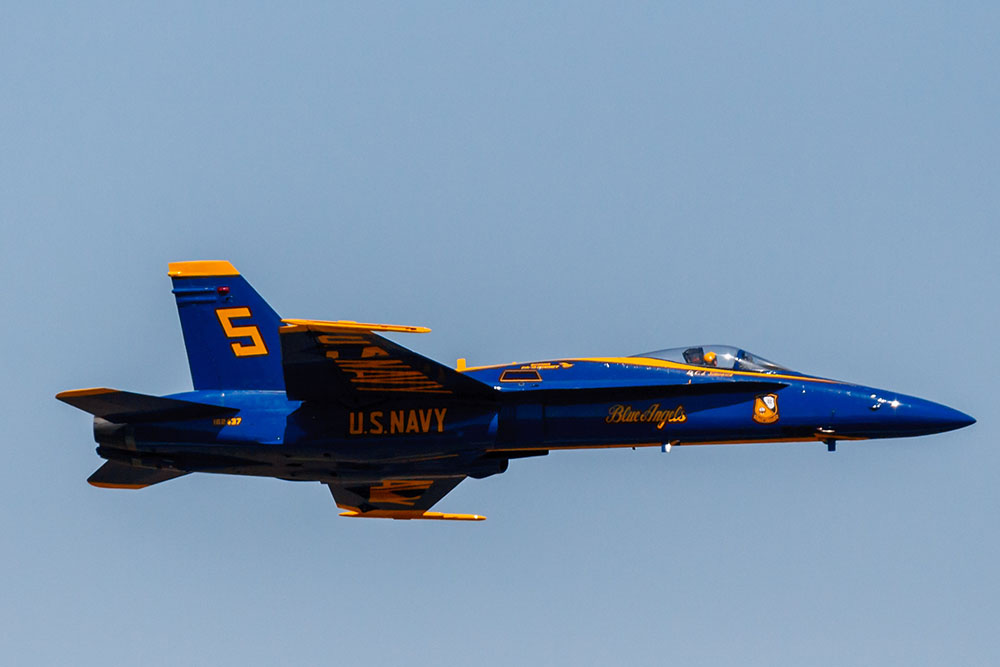 Photo by Rick Pepper - 2012 Mankato Air Show - The lead solo Blue Angel aircraft performs a fly-by