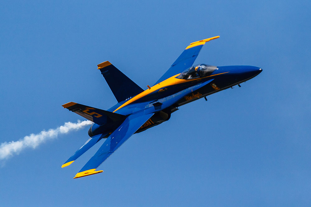 Photo by Rick Pepper - 2012 Mankato Air Show - The Blue Angel lead solo aircraft makes a high speed pass