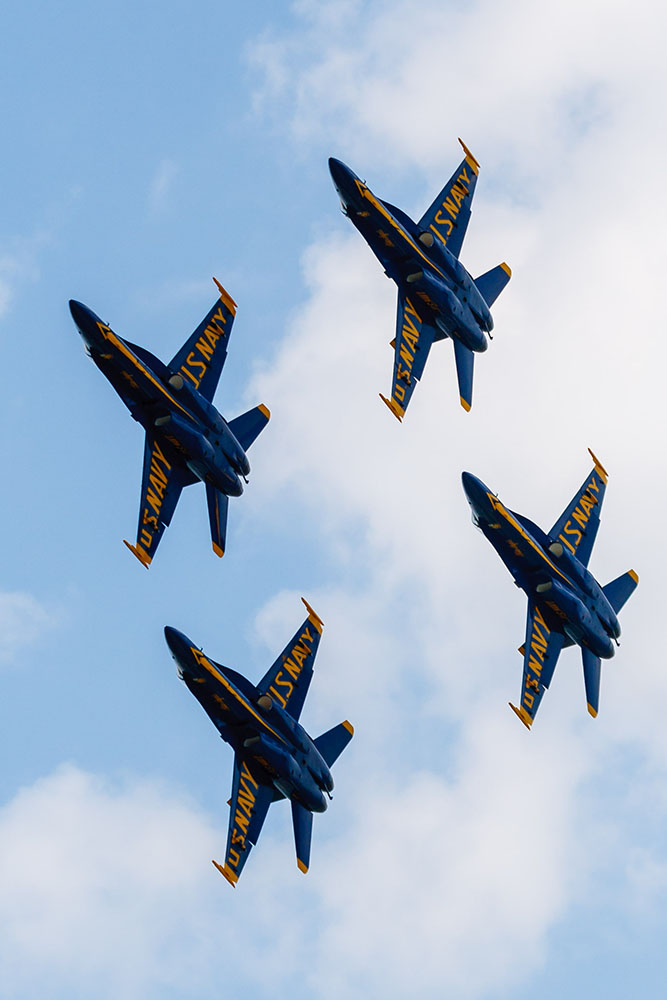 Photo by Rick Pepper - 2012 Mankato Air Show - Blue Angel aircraft 1-4 execute a turn in the diamond formation heading back towards the airshow