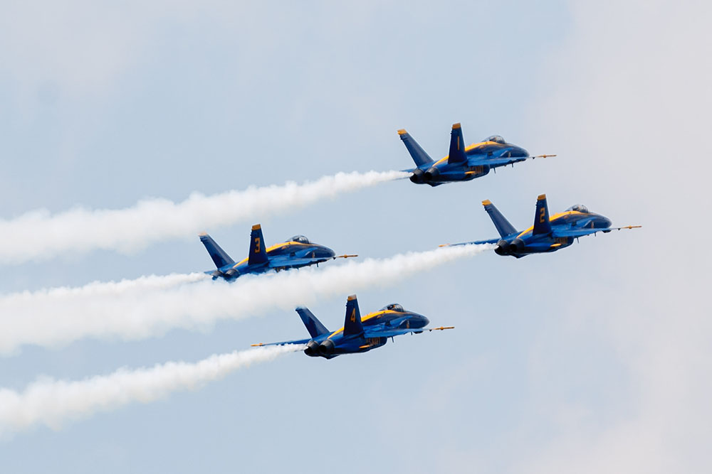Photo by Rick Pepper - 2012 Mankato Air Show - Blue Angel aircraft 1-4 go into a climb to execute a loop in the diamond formation