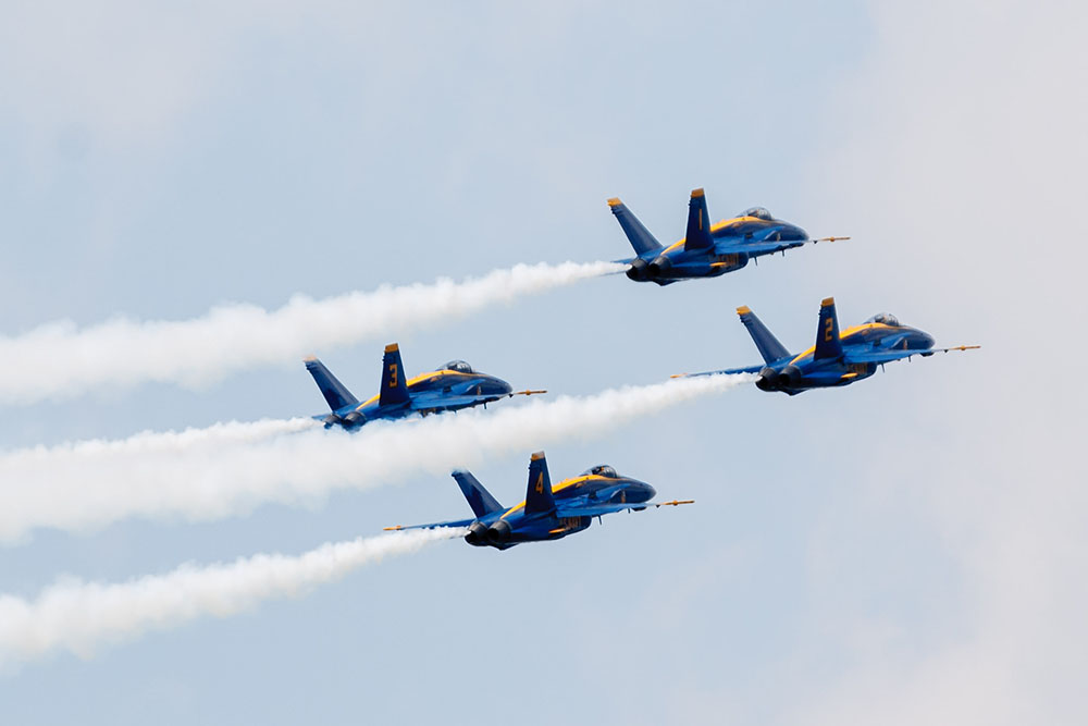 Photo by Rick Pepper - 2012 Mankato Air Show - Blue Angel aircraft 1-4 go into a climb to execute a loop in the diamond formation