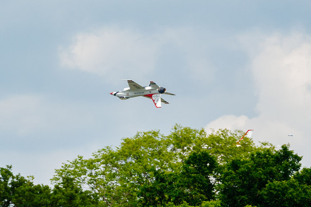 Photo by Rick Pepper - 2015 Mankato Air Show - Thunderbird aircraft 1-4 clearing the tree tops as they perform the diamond with the lead aircraft inverted