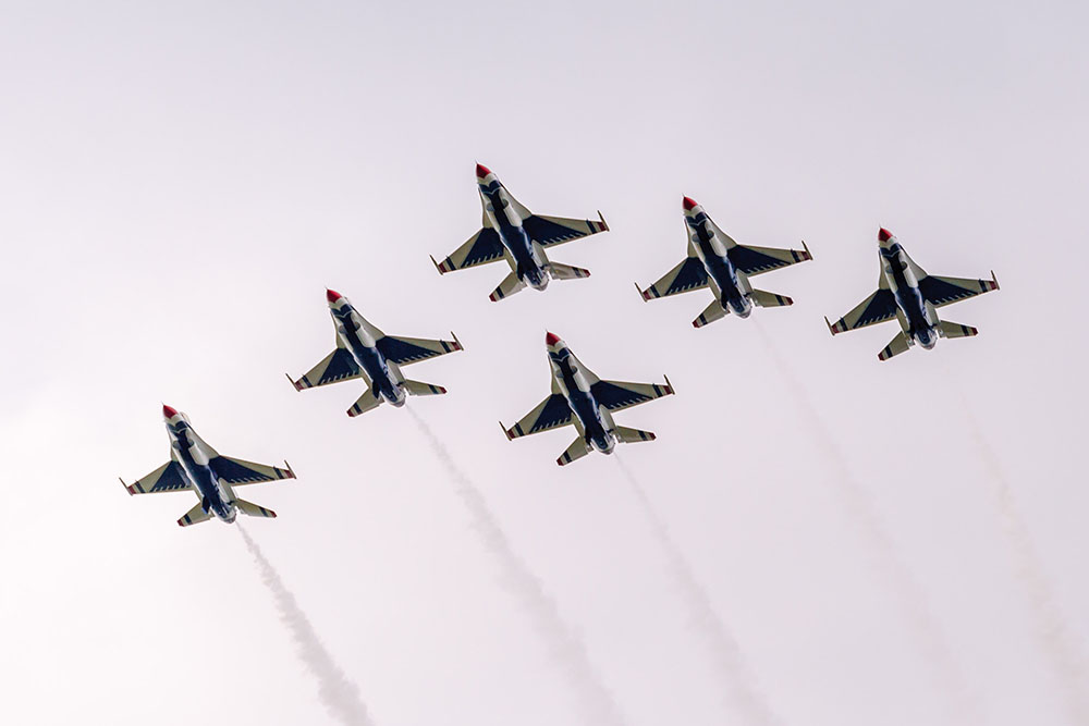 Photo by Rick Pepper - 2015 Mankato Air Show - All Thunderbird aircraft fly overhead in the Delta formation as they approach the airport