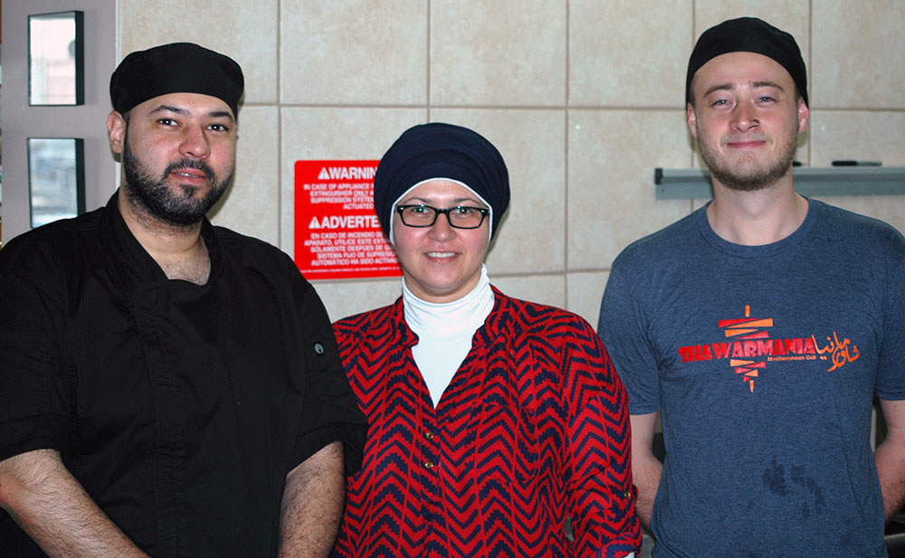 Photo by Don Lipps - From left to right - Ahmad Kiblawi, Laila Kiblawi Ahmad's sister, and employee Michael Pronschinske.