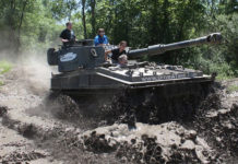 Photo courtesy of Drive A Tank - FV433 Abbot driving through the mud