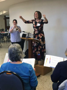 Photo by Grace Brandt - Kristin Ziemke directing the Singing Hills Chorus