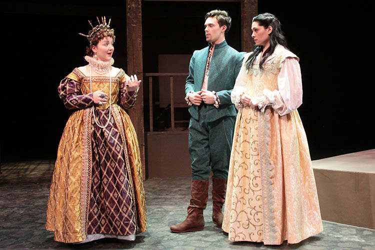 Photo courtesy Minnesota State University, Mankato Department of Theatre & Dance - Queen Elizabeth I (Lindsey Oetken) confronts William Shakespeare (Ryan Joseph Feist) and the Lady Viola de Lesseps (Chloe Sirbu) about the nature of true love.