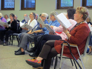 Photo by Grace Brandt - Members of the Singing Hills Chorus rehearsing