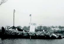 Photo courtesy of Bob Kreuzer - The North Mankato Lift Station, nicked named "Gilligan's Island," surrounded by sandbags to hold back Minnesota River flood waters as the waters were beginning to recede.