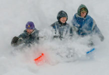 Photo by Rick Pepper - Alec Maertens, Jacob Pepper, Christian House on the Spring Lake Park sliding hill