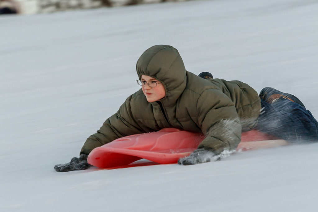 Photo by Rick Pepper - Ben Pepper on the Sibley Park sliding hill