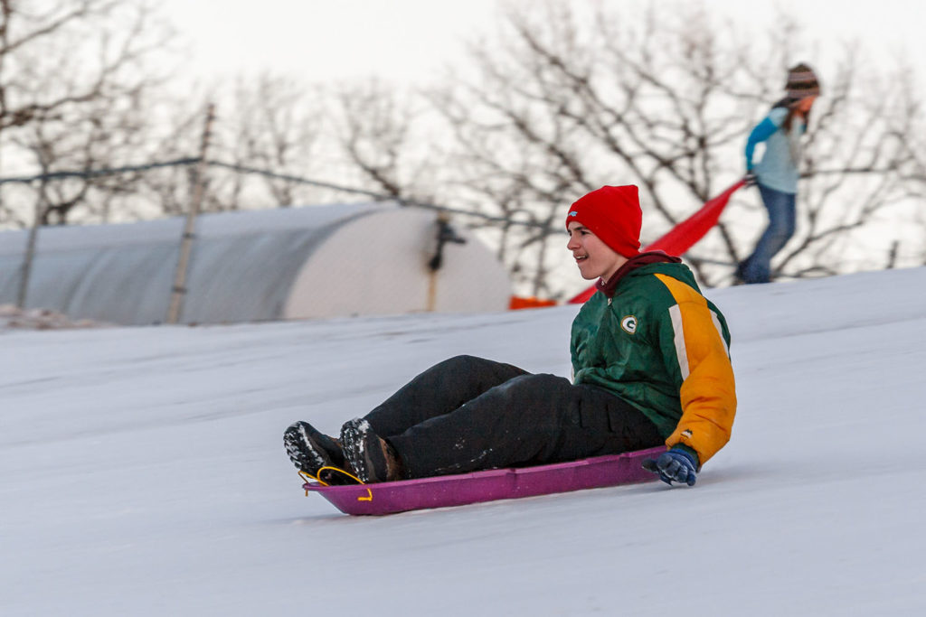 Photo by Rick Pepper - Devin House on the Sibley Park sliding hill