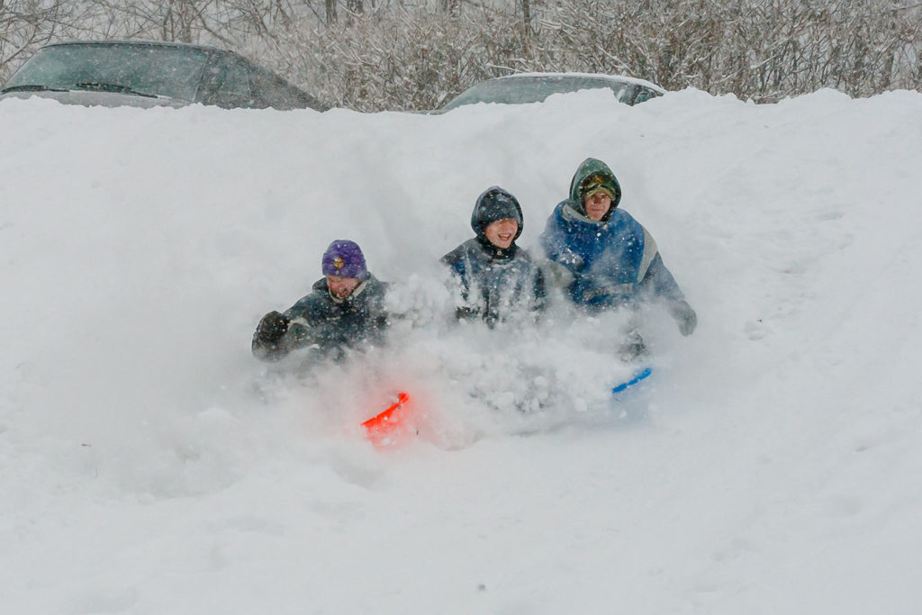 Photo by Rick Pepper - Alec Maertens, Jacob Pepper, Christian House on the Spring Lake Park sliding hill