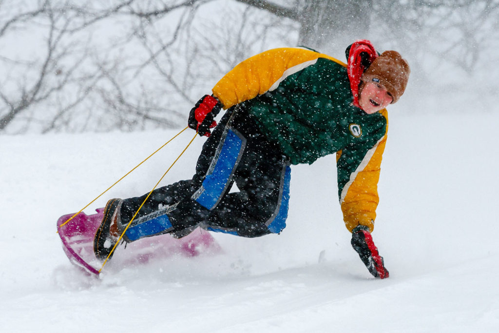 Photo by Rick Pepper - Devin House on the Sibley Park sliding hill