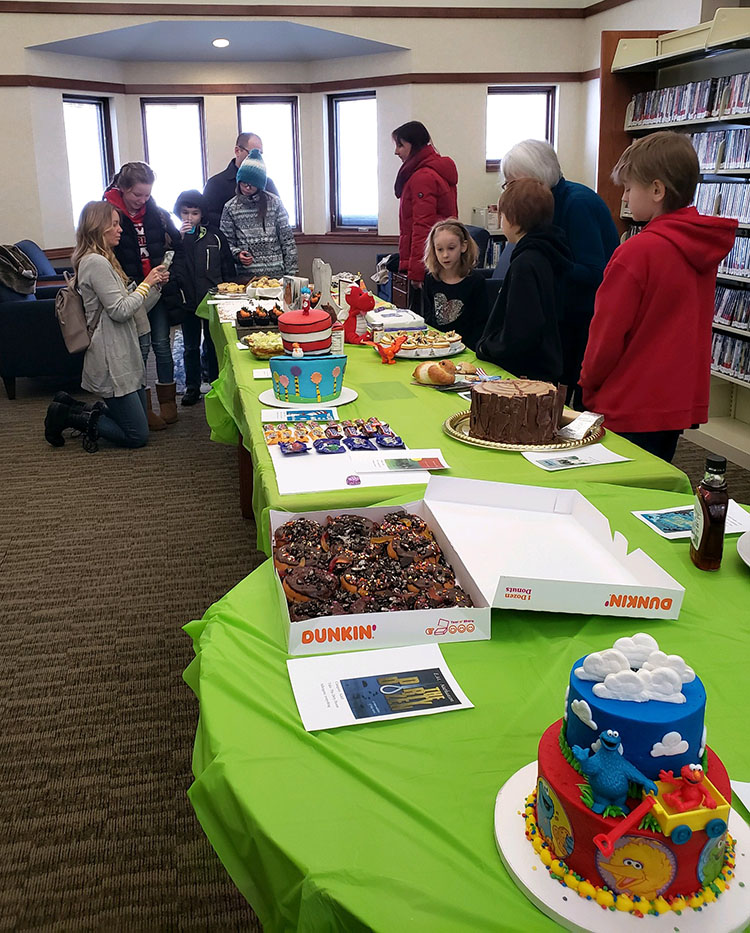Submitted Photo - Visitors enjoying the 2019 Edible Book Festival at the North Mankato Taylor Library
