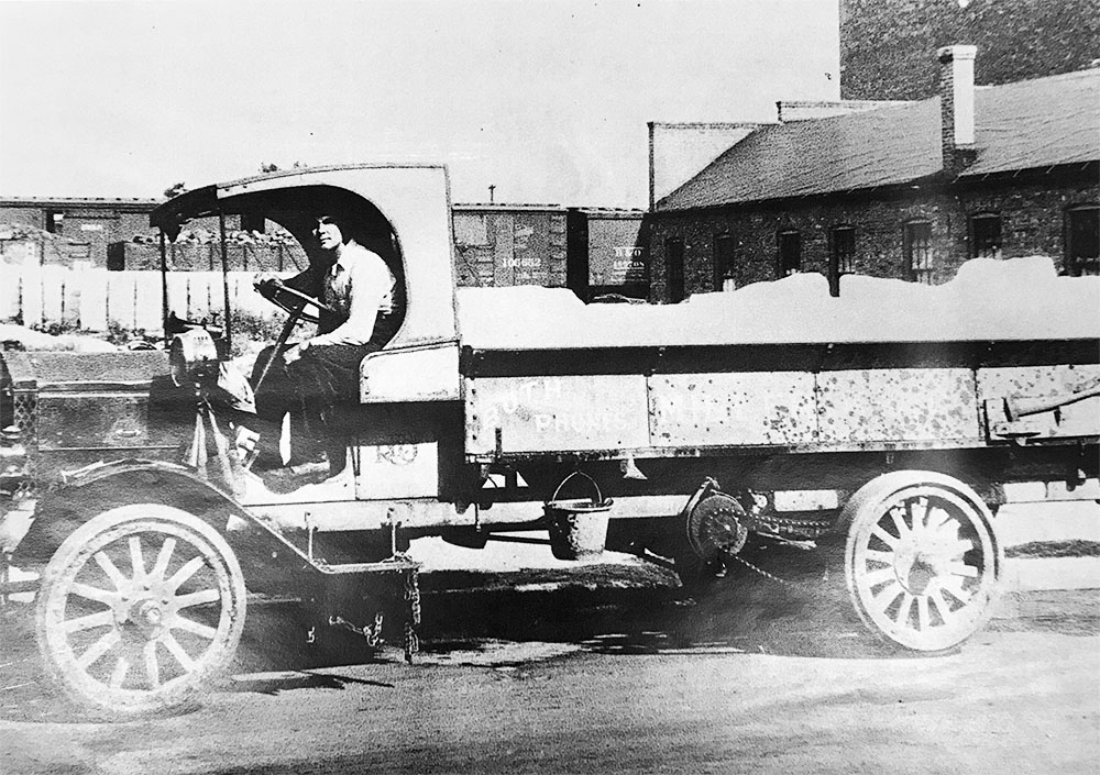 Photo Courtesy of Blue Earth County Historical Society - Miller Ice Company solid wheeled, chain drive Reo truck - Mankato, MN