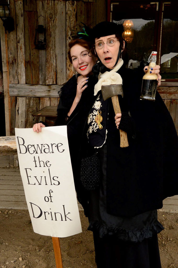 Submitted Photo - Susan Hynes as her character The Temperance Lady and a saloon girl at Mankato's History Fest.
