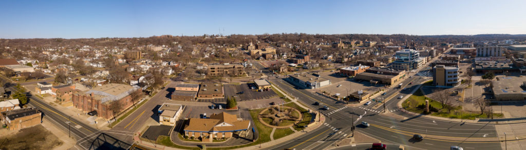 Photo by Rick Pepper - Aerial view of downtown and Old Town Mankato. 2nd Street is bent by the lens through the foreground.