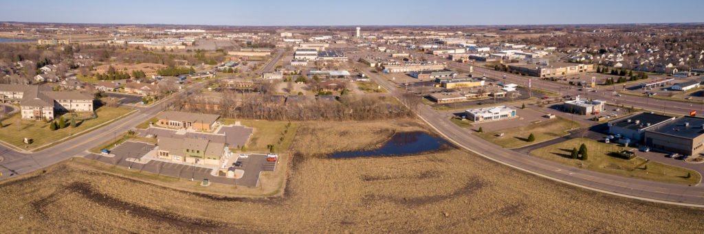 Photo by Rick Pepper - Aerial view looking east while hovering over Madison East Mall. Adams Street is on the left, Tullamore on the right.