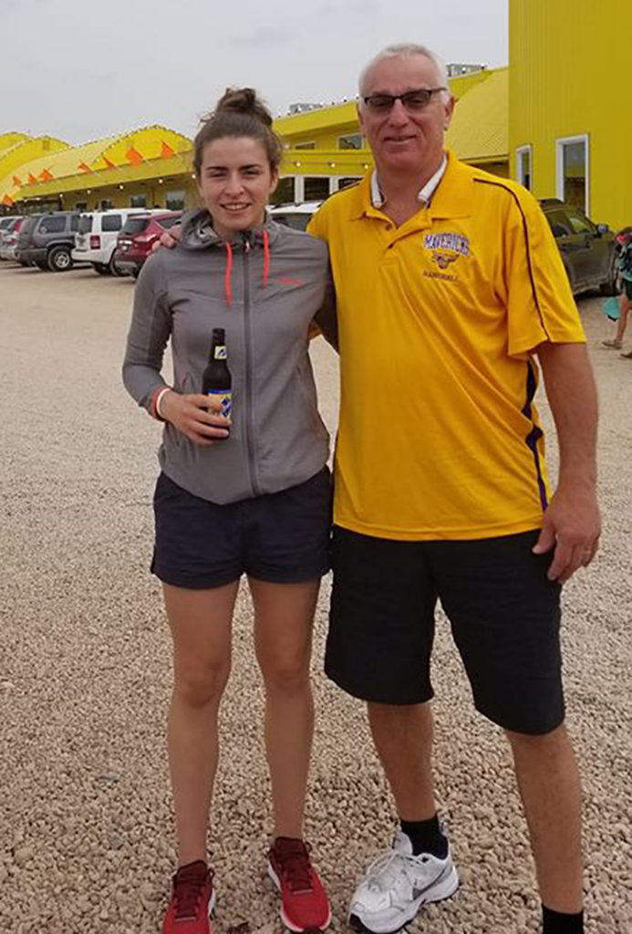 Submitted Photo - Ciana Churraoin and coach Mike Wells enjoying her first American root beer at Jim's Apple Farm in Jordan