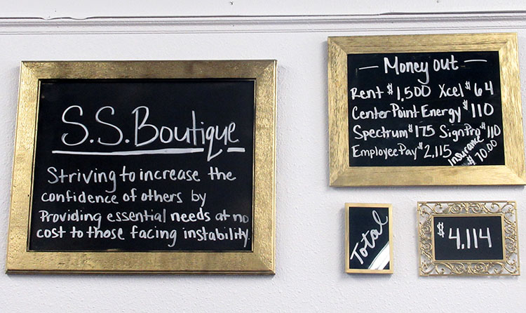 Photo by Grace Brandt - Mission Statement and statistics at SS Boutique