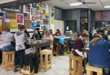 Submitted Photo - Participants at work at Design & Wine's space on Belgrade Avenue in North Mankato