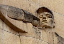 Photo by Mike Lagerquist - Detail of the Lineman on the Consolidated Communications building in Mankato