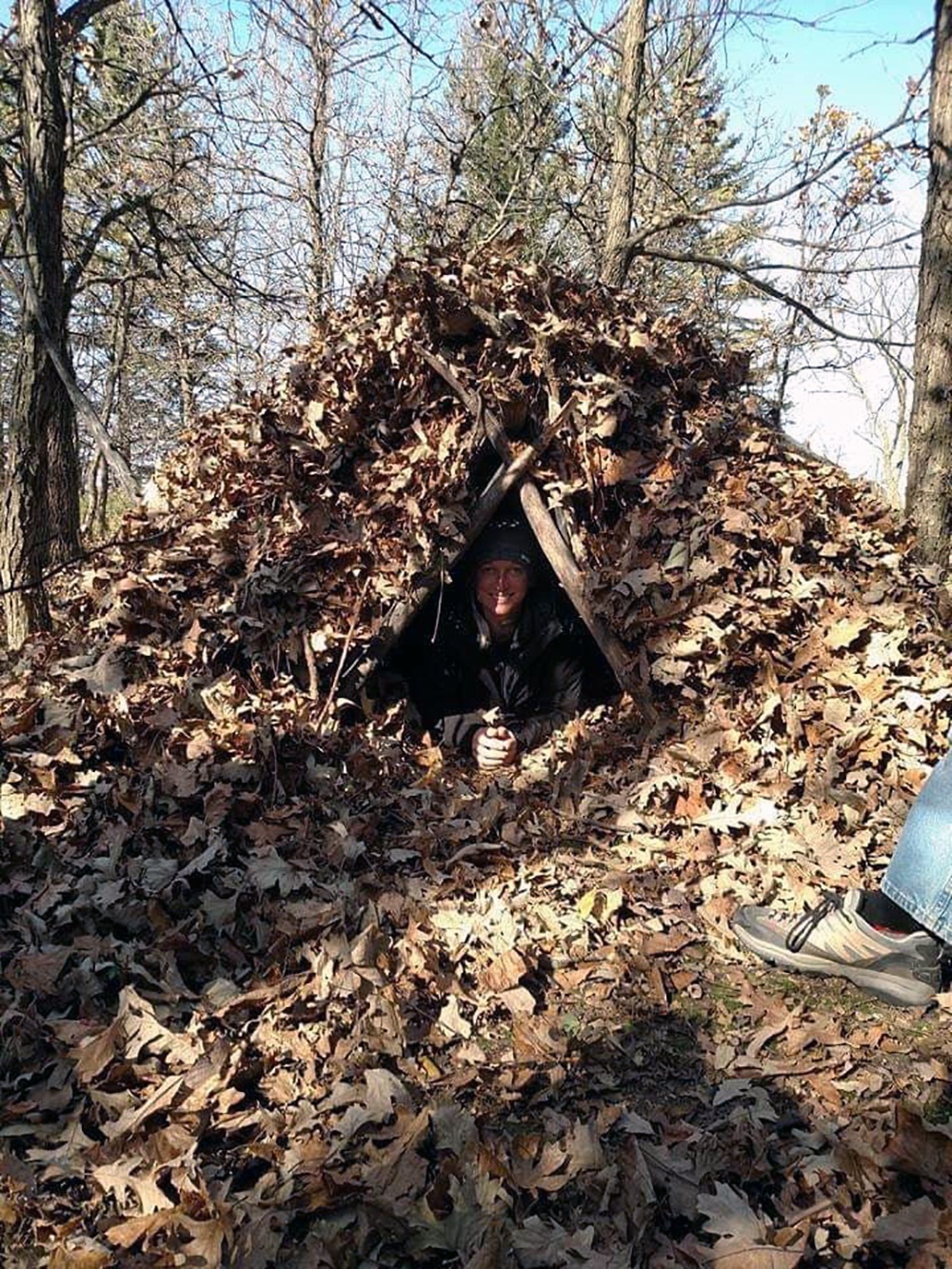 Submitted Photo - Debris hut shelter - Minnesota Primitive Skills and Survival School