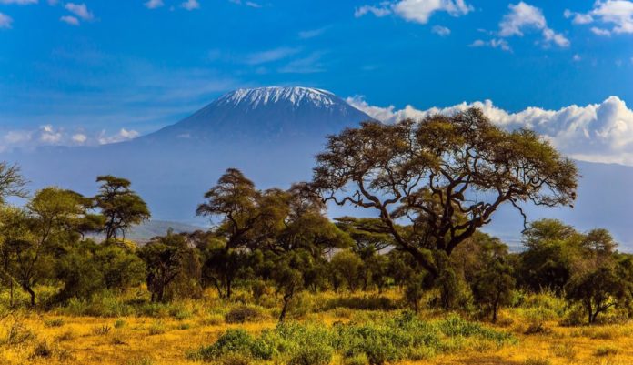 Mount Kilimanjaro and its three volcanic cones, Kibo, Mawenzi and Shira, is a dormant volcano in Tanzania and the highest peak in Africa