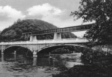 From History of the Red Jacket Valley by Julie A. Schrader - Post card of the Red Jacket Bridge and Trestle, circa 1912