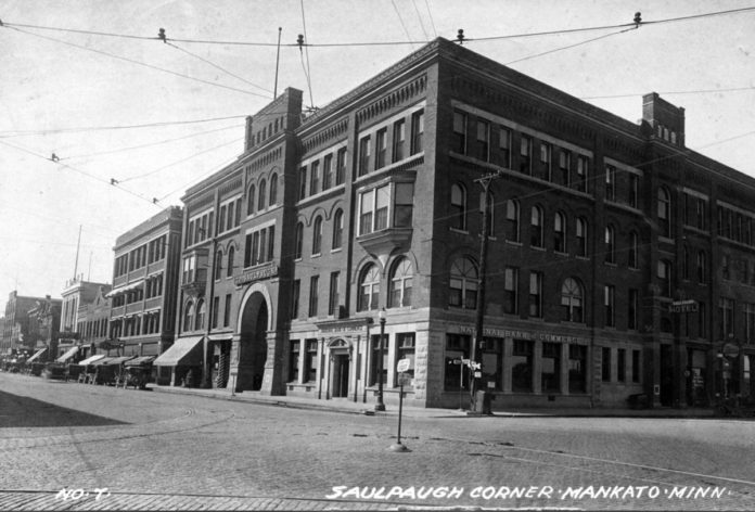Photo courtesy Maud Hart Lovelace’s Deep Valley by Julie A. Schrader - The Saulpaugh Hotel was located where the City Center Hotel sits today. This photograph shows the main entrance to the hotel as it faces South Front Street with Main Street in the foreground, circa 1925. Originally there was an entrance on the Union Depot and Minnesota River side of the hotel. At that time most patrons arrived by steamboat or railroad. The image was taken from approximately where the south entrance of the Blue Earth County Library sits today. The current City Center Hotel ramp sits where South Front Street met Main Street.