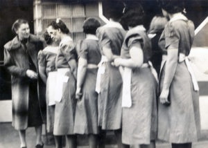 Photo Courtesy of Lowell Johnson - Waitresses in front of the Blue Blazer Café, circa 1930s