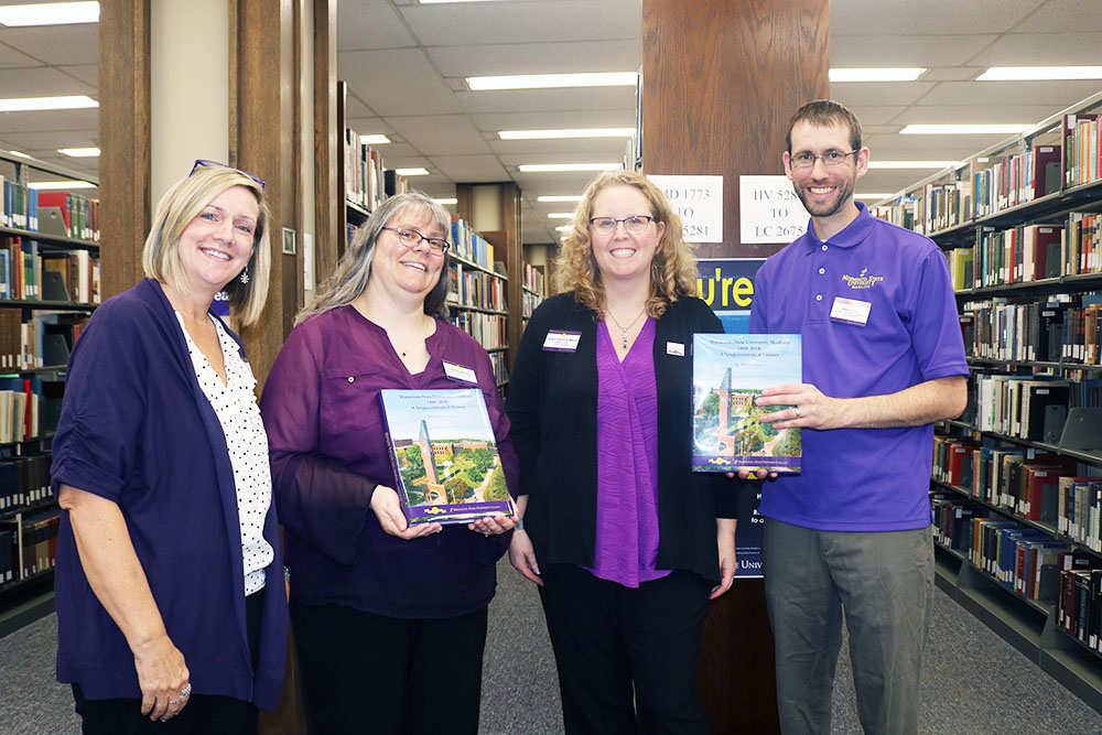Submitted Photo - The University Archives staff at Minnesota State Mankato and members of the project team. Left to Right Anne Stenzel, Heidi Southworth, Daardi Sizemore Mixon, and Adam Smith