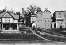 Photo from the Standard Historical and Pictorial Atlas and Gazetteer of Blue Earth County, MN, 1895 - The Bierbauer Brewery stood at the end of Rock Street in Mankato for many years. The brewery buildings are now gone. Albert and Lillie Bierbauer’s house, which is pictured on the left, still remains on the corner of 6th and Rock Streets. This photo was taken in 1895 and at the time the brewery was producing 18,000 barrels annually.