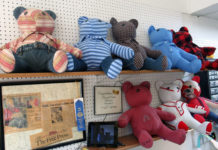 Photo by Grace Brandt - Memory bears at Pins and Needles Alterations in Mankato