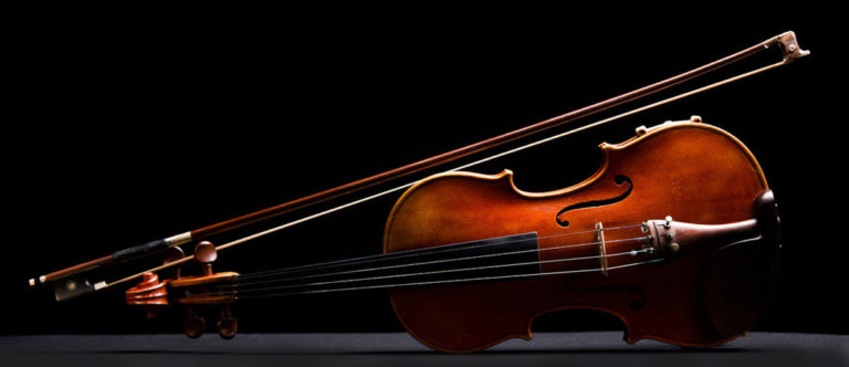 Violin on a black background