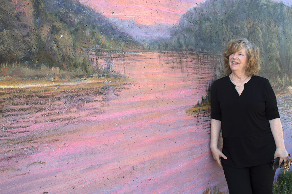 Photo by Rachael Jaeger - Julie Johnson Fahrforth in front of the Mni Mural