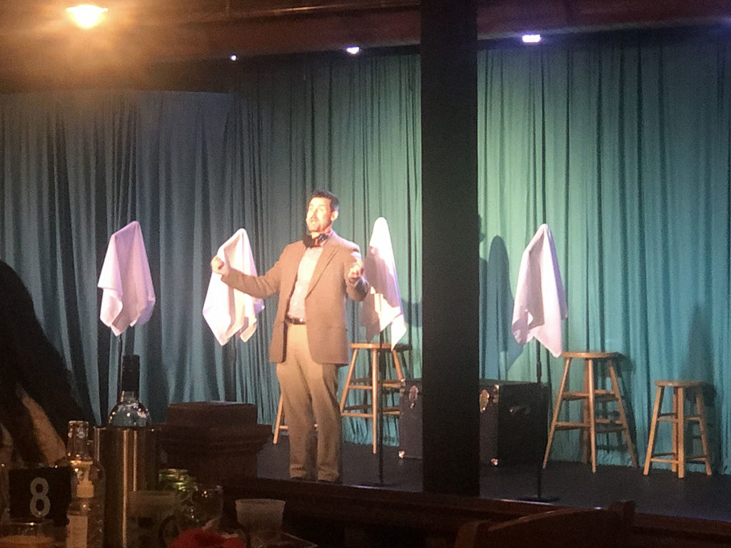 Photo by Mike Lagerquist - David Holmes speaks to the audience before a performance of “Forever Plaid” in August.