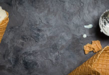 Vanilla ice cream on rustic background, top view