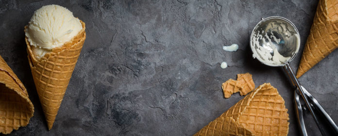 Vanilla ice cream on rustic background, top view