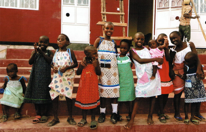 Submitted Photo - Some of the recipients of The Little Dresses project